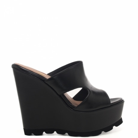 scarpe alte da donna con suola seghettata nere