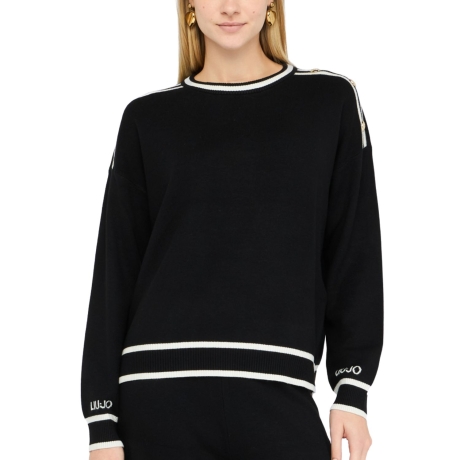 maglia chiusa da donna con dettagli a contrasto e bottoni applicati sulle spalle nero bianco