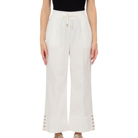 pantaloni da donna in cotone a gamba larga con borchie sul fondo bianco latte