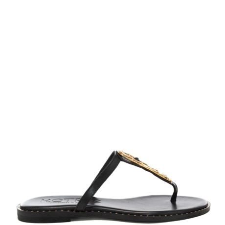 scarpe basse da donna infradito con dettaglio in metallo frontale nero