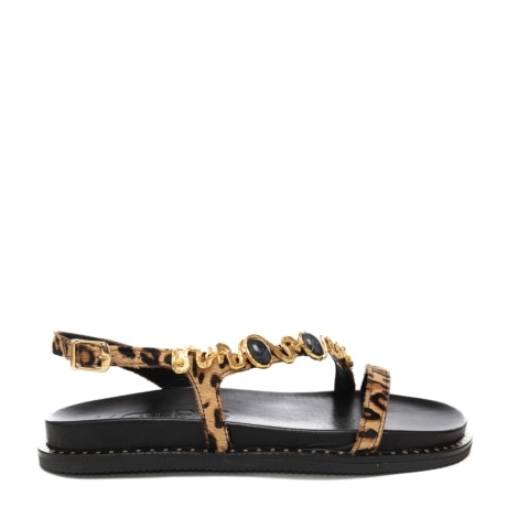scarpe basse da donna con stampa animalier e inserti in metallo dorato nero 